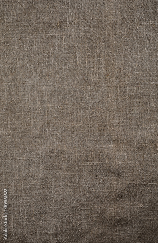 Burlap, natural coarse cloth, tablecloth with folds