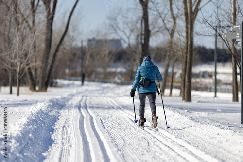 Cross country skiing in a park during winter