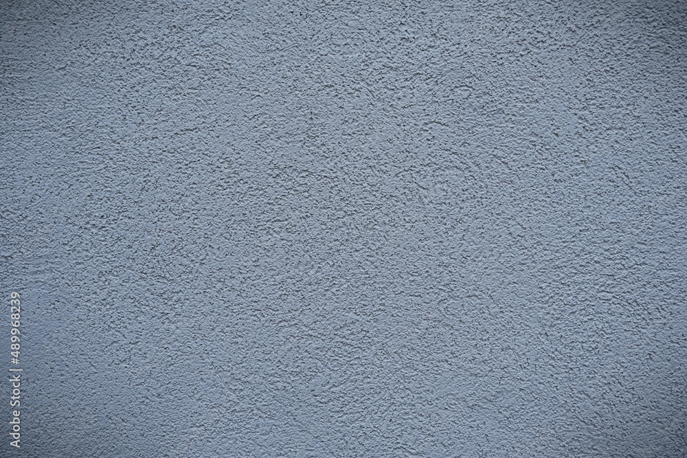 Gray concrete wall with grunge and dark vignette. Gray concrete wall with grunge and dark vignette.