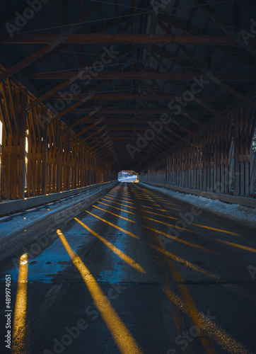 A photo inside of the Smolen-Gulf Covered Bridge at dusk in Ashtabula, Ohio photo