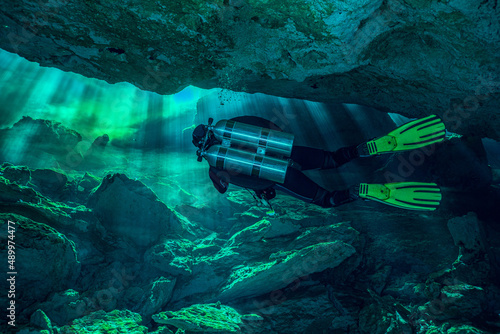 Cave Diver Scuba Diving in Deep Mexican Cenotes photo