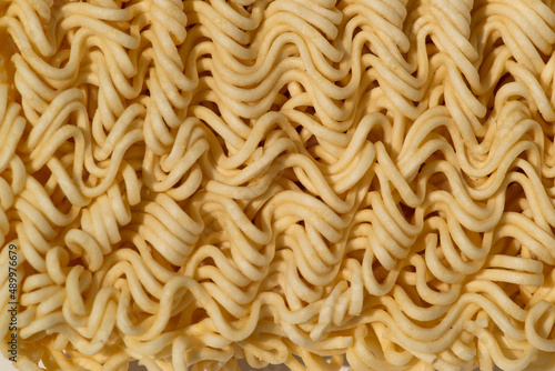 close-up raw asian instant noodles, ready-to-go food and economical of the ASEAN people image on white background