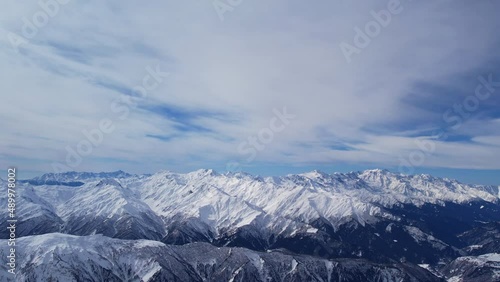 Winter drone flight over Mestia`s mountains in gerorgia. 
Tetnuldi Ski Resort next to Tetnuldi Peak and Uschba Peak. photo