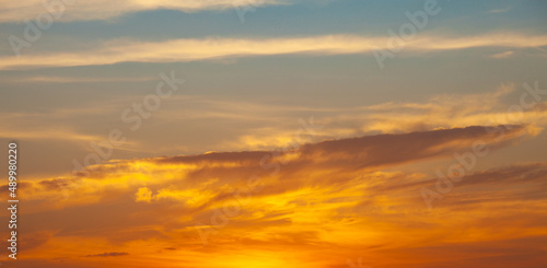 Golden sky at sunset. Concept of relaxation with natural scenery. Romantic mood. © kheartmanee