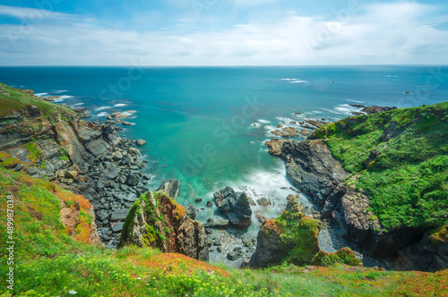 The Lizard peninsula,clifftop and rocky cove in summertime,southern Cornwall, England, United Kingdom.