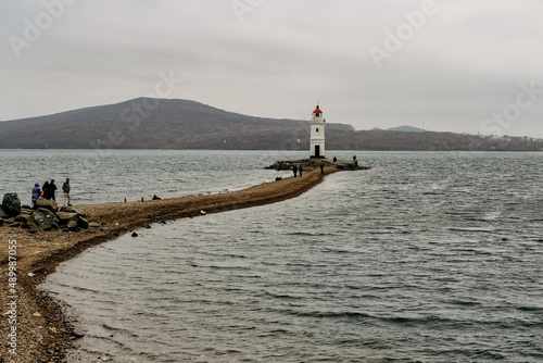 Nature, sights, architecture and life of the city of Vladivostok. Lighthouse in the bay © Irina B