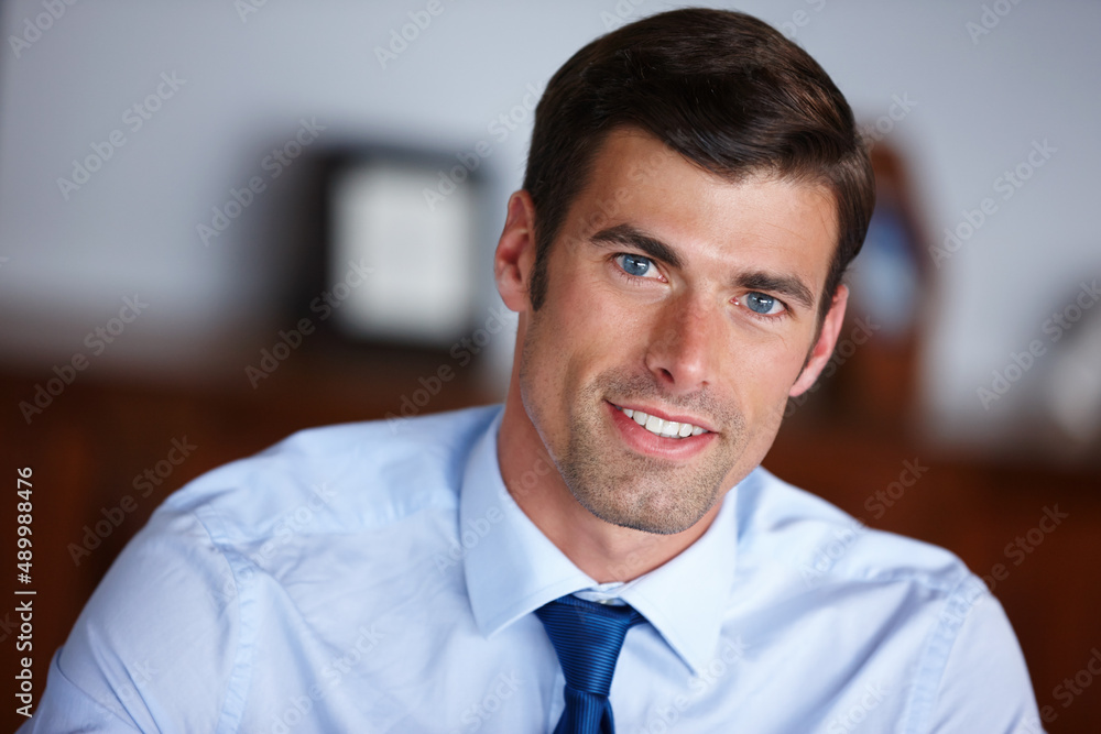 His business venture starts here. Cropped portrait of a handsome businessman sitting in his office. His business venture starts here. Cropped portrait of a handsome businessman sitting in his office.