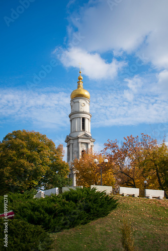 View of the Assumption Cathedral from the Merchants' Bridge, Kharkov, Ukraine. The photo was taken in Kharkov, Ukraine, from the Merchants' Bridge on October 12, 2021.