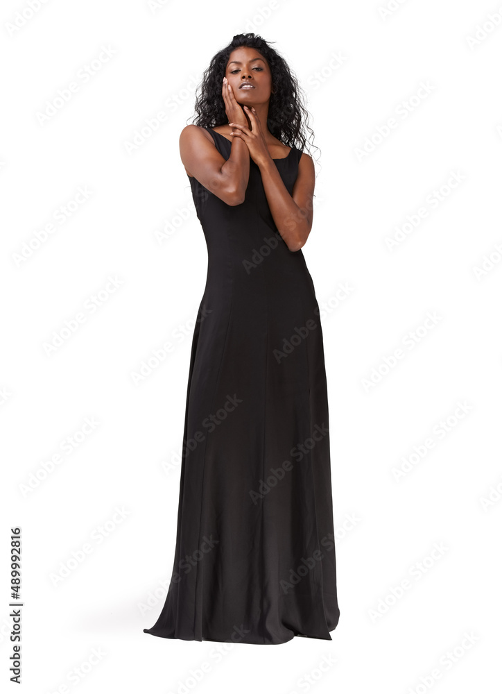 Glamorous beauty. Full length studio shot of a beautiful indian woman in a long black dress.