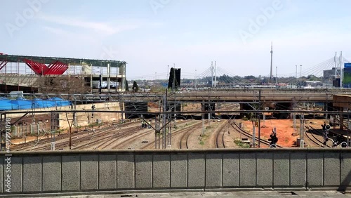A static shot overlooking the empty railway tracks from the Rissik Street bridge in downtown Johannesburg, South Africa photo