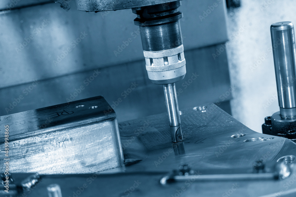 The CNC milling machine rough cutting the injection mold parts by indexable endmill tools. The CNC milling machine rough cutting the injection mold parts by indexable endmill tools.
