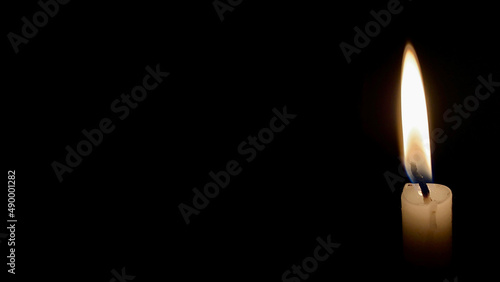Candle light with dark background. Candle light concept.