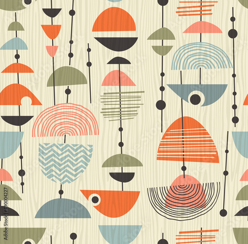 Seamless abstract mid century modern pattern for backgrounds, fabric design, wrapping paper, scrapbooks and covers. Fun retro design. Vector illustration.