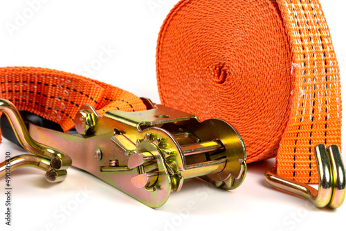 Ratchet straps to control load loading. Cargo securing belt. Close-up on a white background photo