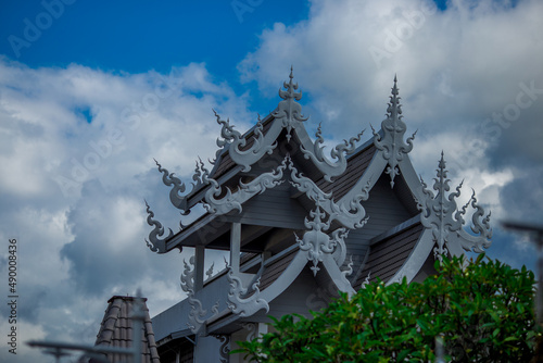 Wallpaper Mural background Wat Rong Khun The White Temple and pond with fish, in Chiang Rai, Thailand Torontodigital.ca