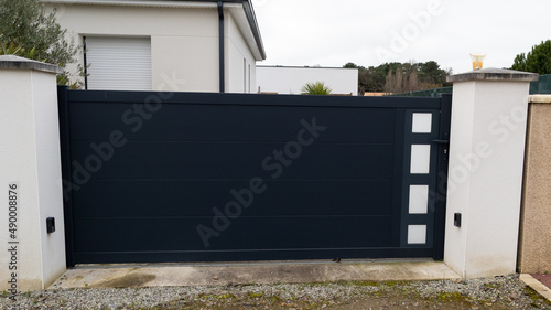 dark gray aluminum gate grey portal of suburb house door access