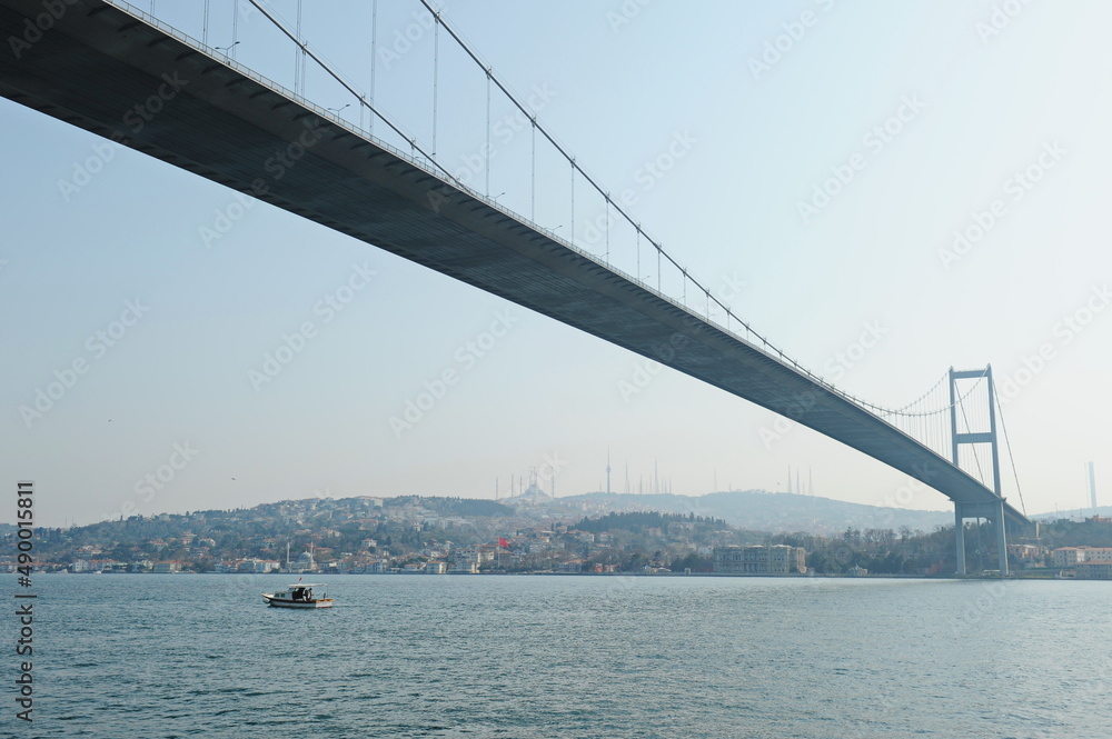 Istanbul / Turkey - 02.28.2017 : Coastal zone and architecture of the Bosphorus Strait. A bridge connecting Europe and Asia. Istanbul / Turkey - 02.28.2017 : Coastal zone and architecture of the Bosphorus Strait. A bridge connecting Europe and Asia.
