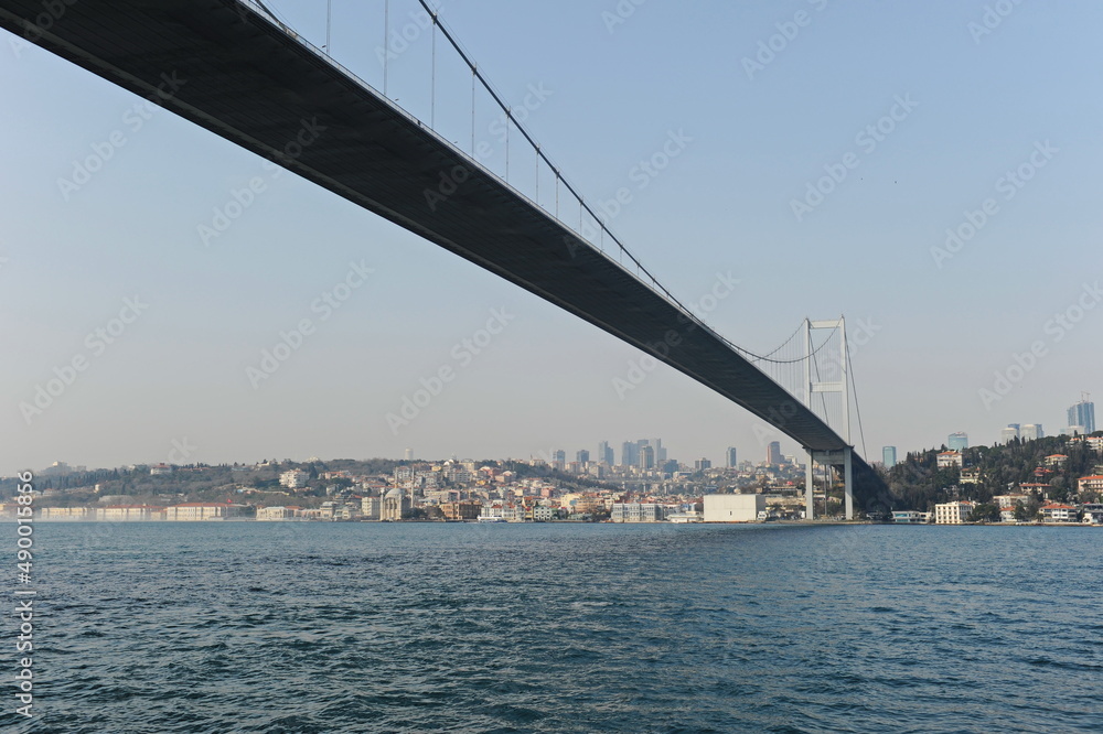 Istanbul / Turkey - 02.28.2017 : Coastal zone and architecture of the Bosphorus Strait. A bridge connecting Europe and Asia. Istanbul / Turkey - 02.28.2017 : Coastal zone and architecture of the Bosphorus Strait. A bridge connecting Europe and Asia.