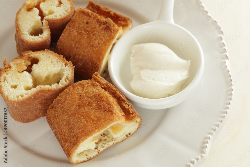 Asian deep dried bun served with cream cheese Asian deep dried bun served with cream cheese