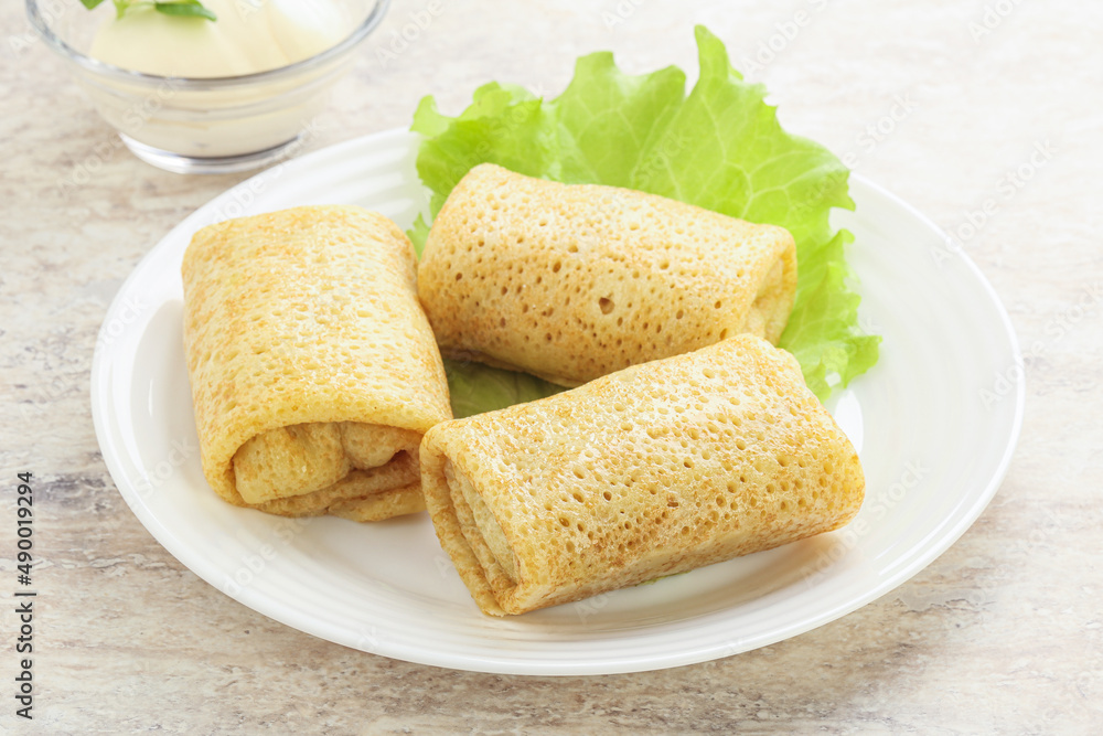 Stuffed pancakes with meat and cream Stuffed pancakes with meat and cream
