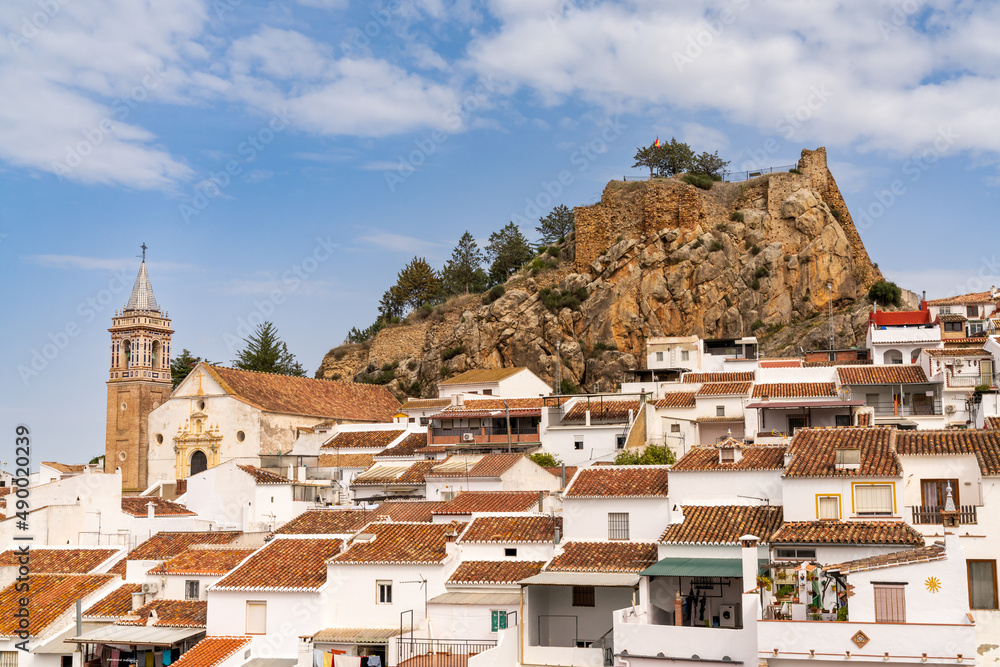 the historic whitewashed Andalusian village of Ardales with its church and Moorish castle ruins