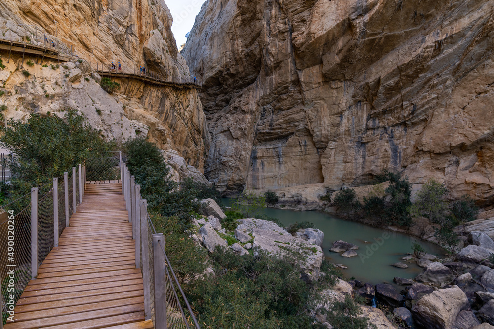 tourists enjoy hiking the Camino del Rey on a bautiful winter day