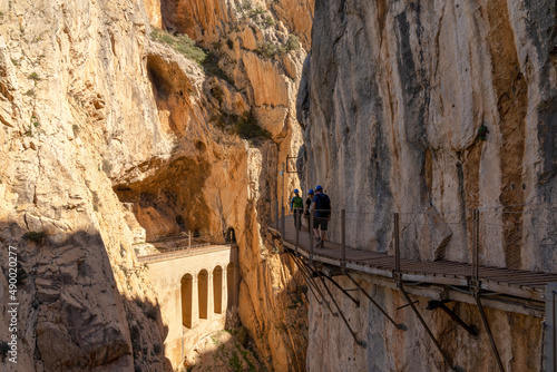 tourists enjoy hiking the Camino del Rey on a bautiful winter day photo