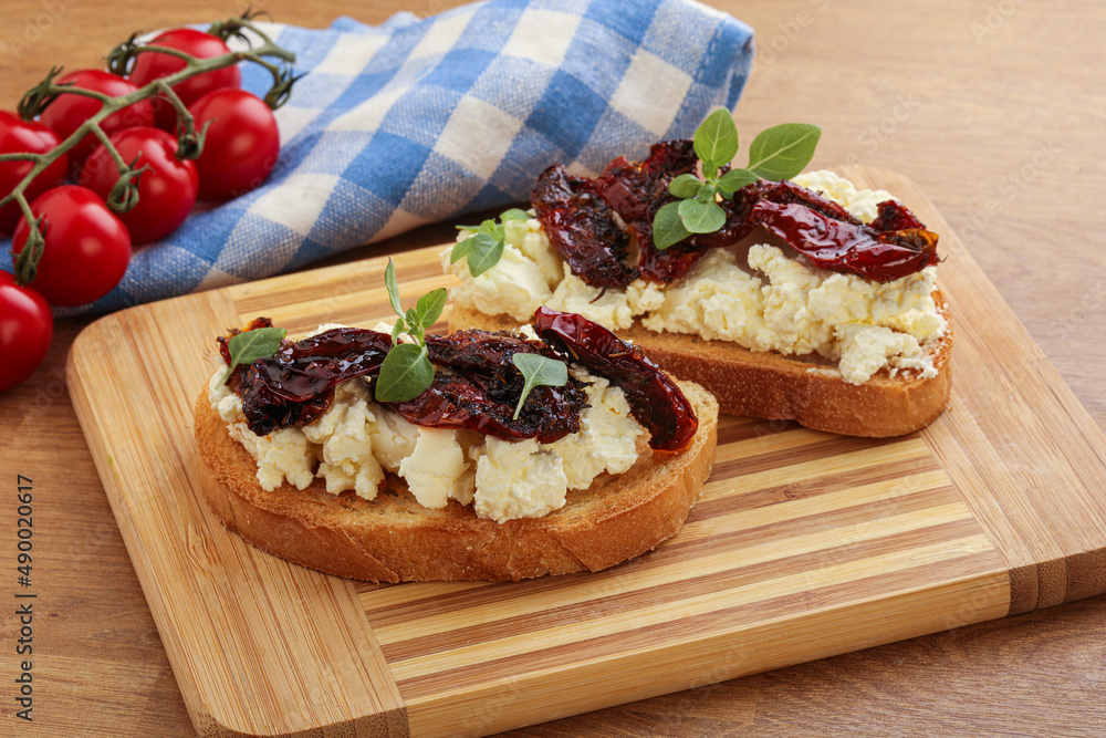 Bruschetta with soft cheese and tomato Bruschetta with soft cheese and tomato