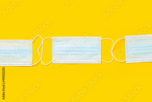 Surgical masks on color bac...