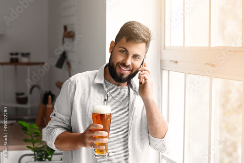 Handsome bearded man with g...