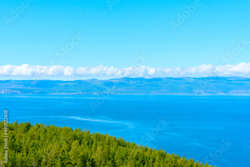 Lake Baikal at sunny summer day. Beauty of nature concept. Soft focus