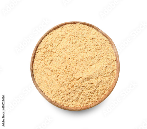 Bowl of ginger powder isolated on white background