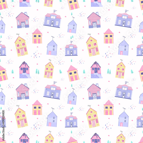 Seamless pattern with cute houses. Hand drawn vector illustration for nursery textile or wallpaper design. © Gingerbirb