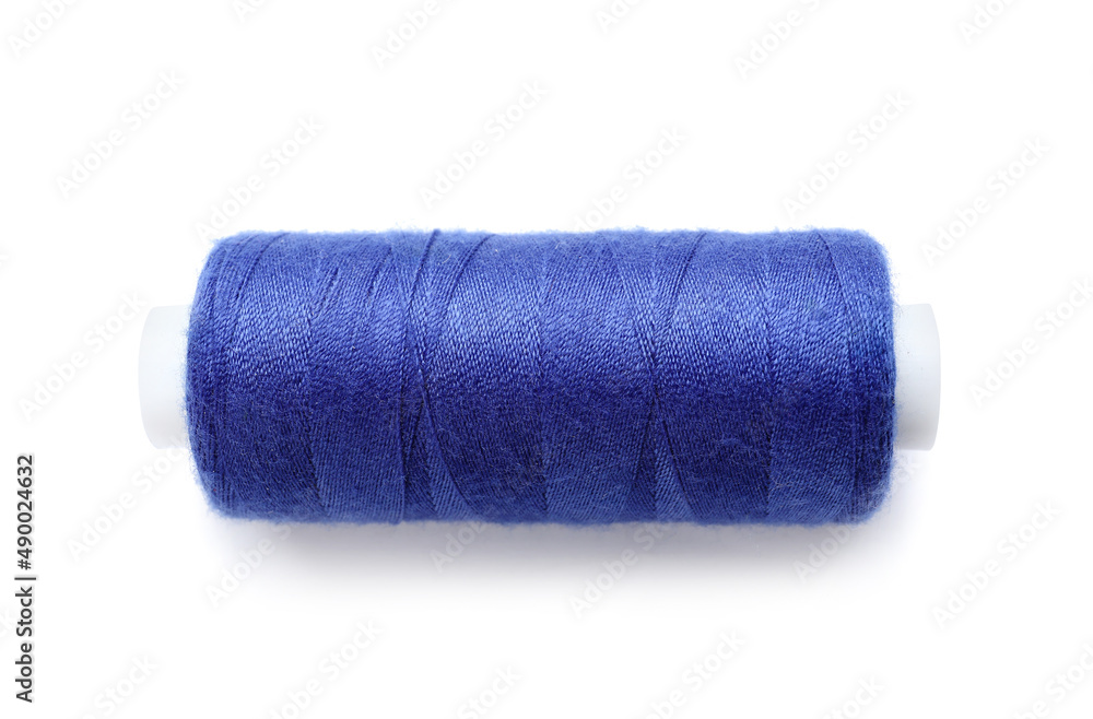 Bright sewing thread spool on white background Bright sewing thread spool on white background