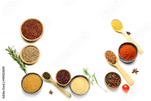 Composition with different aromatic spices on white background