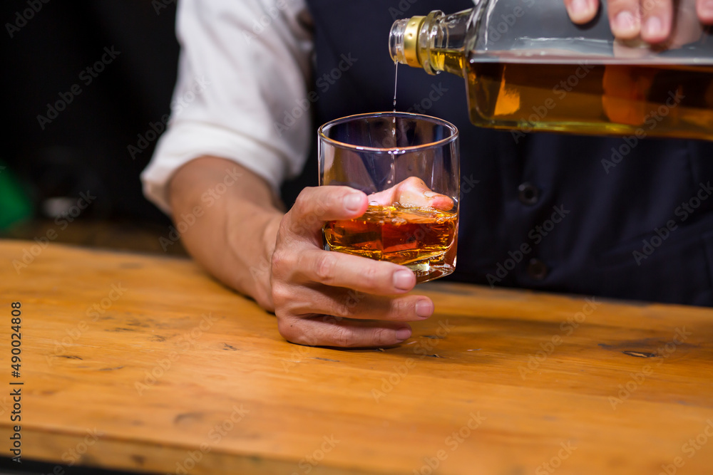 Bartender Serve Whiskey, on wood bar, Bartender Serve Whiskey, on wood bar,
