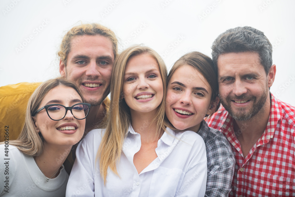 Photo of happy company students best friends making selfies. Group of happy people young friends, close up face. Photo of happy company students best friends making selfies. Group of happy people young friends, close up face.