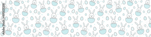 Easter banner with bunnies and decorative eggs. Seamless pattern. Vector