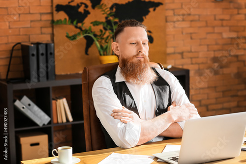 Handsome bearded businessma...