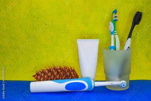 Toothbrushes on a yellow background. Health care  dental hygiene. Space for text. Top view
