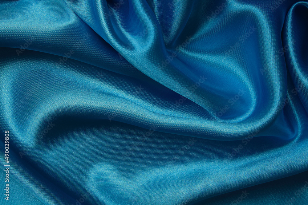Fototapeta premium Dark blue fabric texture background, detail of silk or linen pattern.