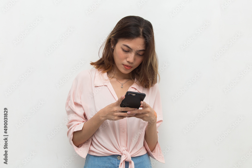 young asian beautiful woman using mobile phone isolated on white background young asian beautiful woman using mobile phone isolated on white background
