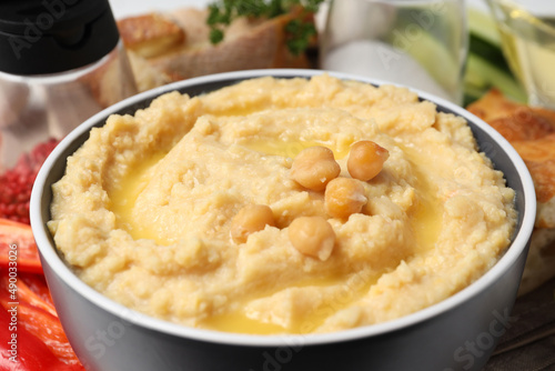 Concept of tasty food with hummus, close up