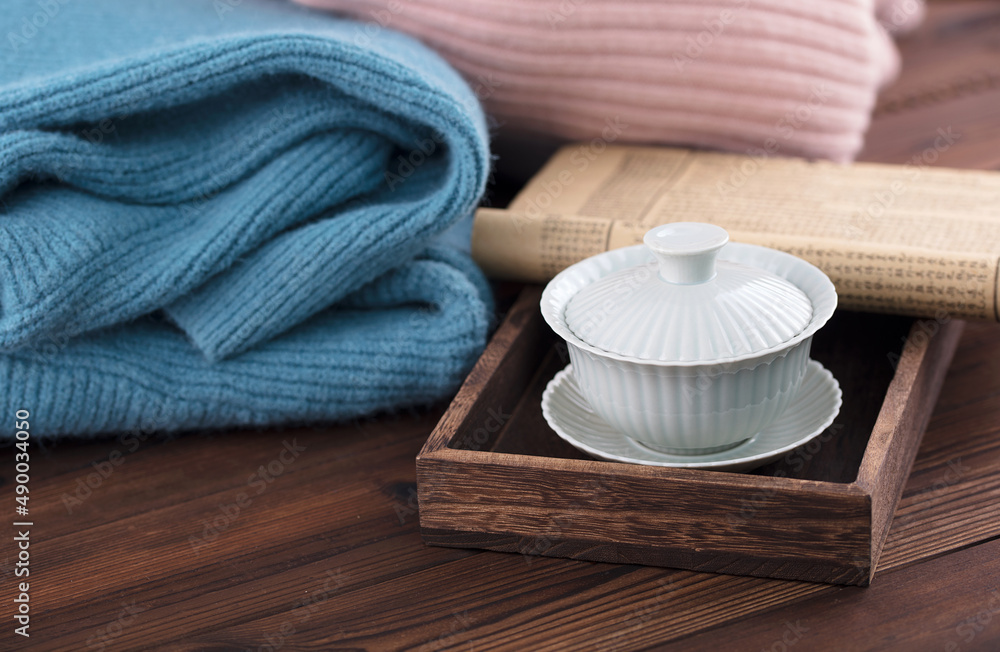 Covered bowl tea and winter sweaters Covered bowl tea and winter sweaters