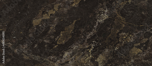 Natural stone texture. Brown marble, matt surface, Italian slab, granite, ivory texture, ceramic wall and floor tiles. Rustic Natural porcelain stoneware background high resolution. Limestone pattern. © Maksim