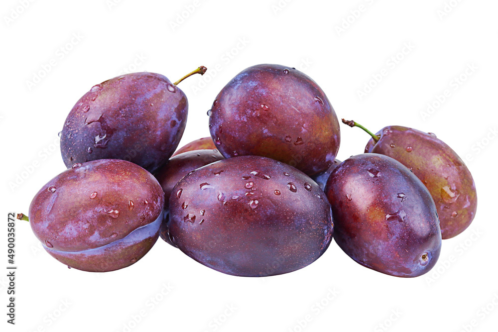 Fresh plums with water drops isolated on a white background.