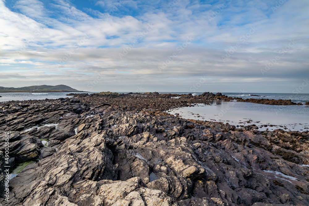 The rocks of Carrickfad by Portnoo at Narin Strand in County Donegal Ireland The rocks of Carrickfad by Portnoo at Narin Strand in County Donegal Ireland