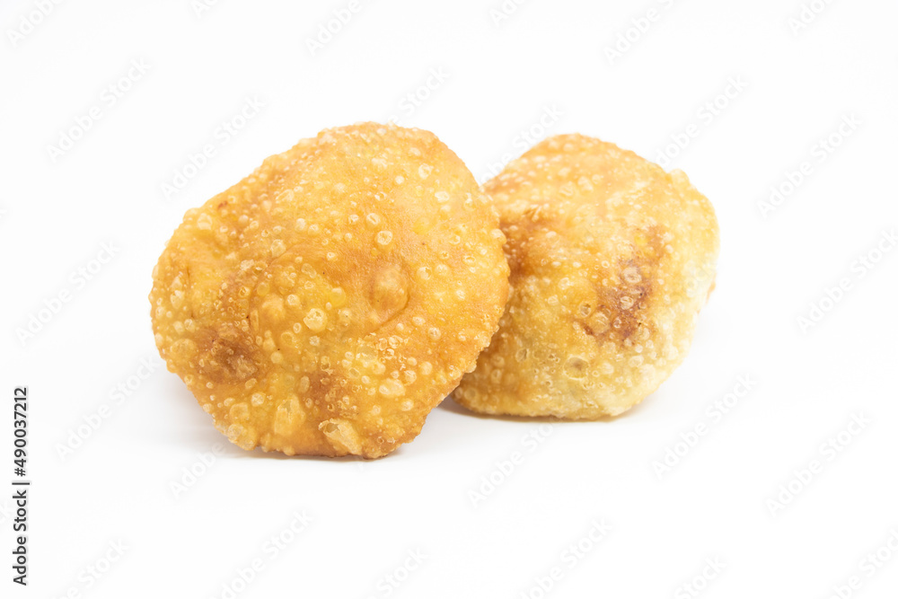 deep fried puri isolated on a white background deep fried puri isolated on a white background