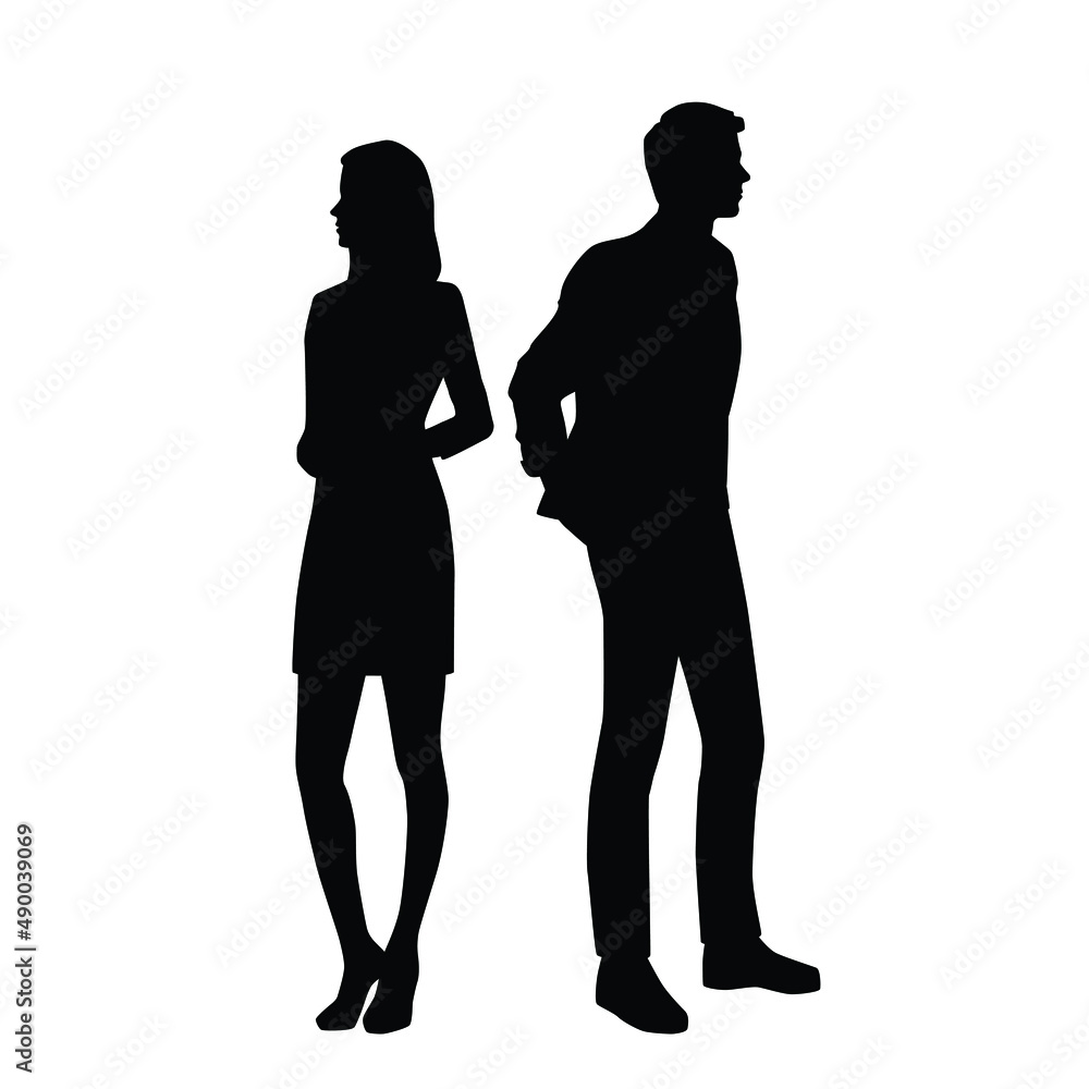 Vector silhouettes of  man and a woman, a couple of standing business people, black color isolated on white background