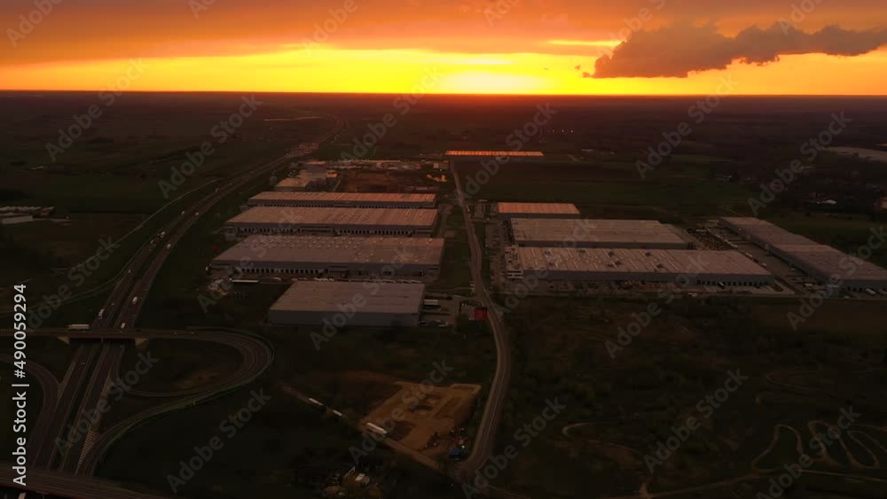 custom made wallpaper toronto digitalSemi-trailers trucks are waiting for the loading and unloading of goods at the warehouse ramps in a large logistics park with a loading hub. Aerial view at sunset